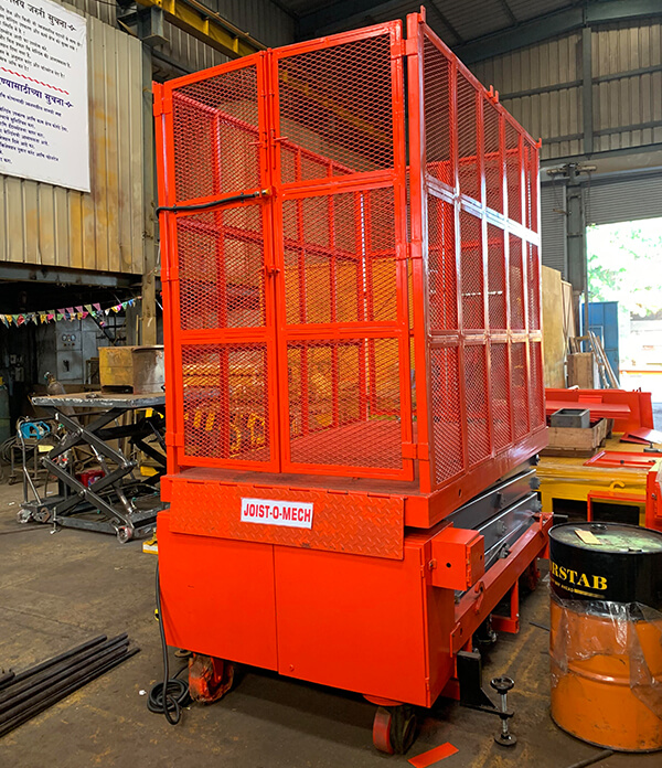 Aerial Cage Scissor Lift manufacturer in Mumbai Navi Mumbai Pune Bangalore Hydraulic mysore Delhi chennai Vapi
